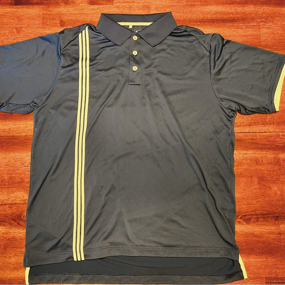 Adidas ClimaCool golf polo. Navy blue with white embroidered accent stripes.